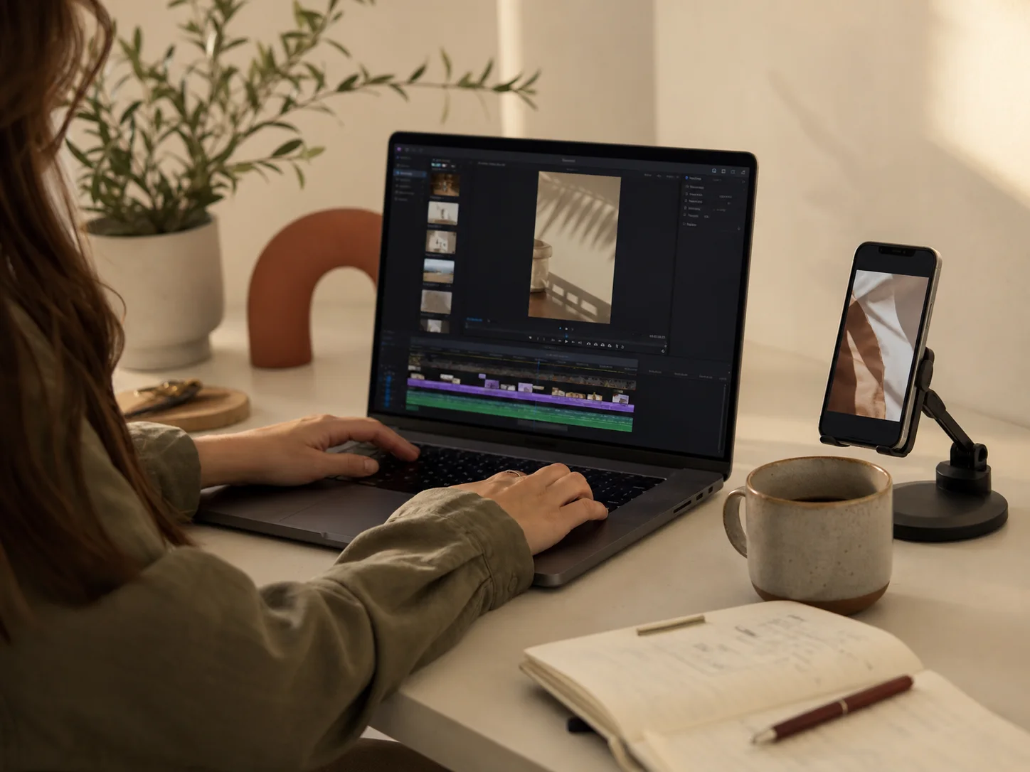 UGC creator editing a vertical product video on a laptop